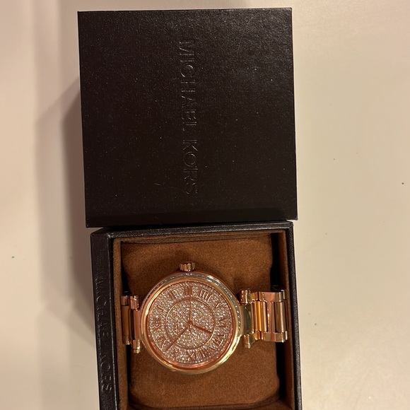 Michael Kors watch in Rose Gold. Never worn.